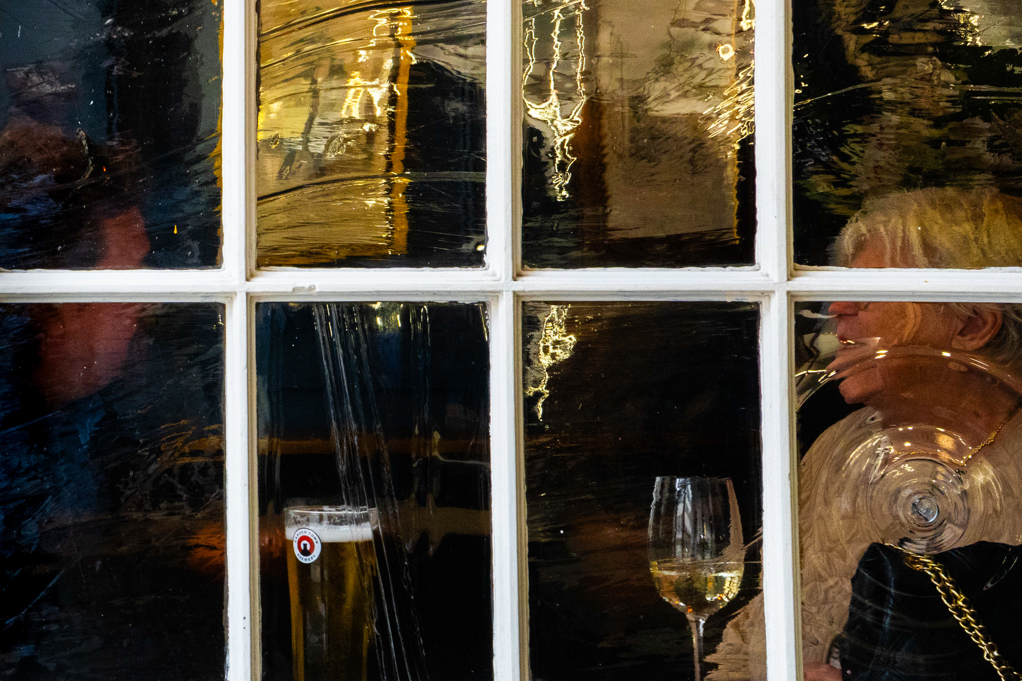 Atmospheric vintage pub window setting landscape frame, London